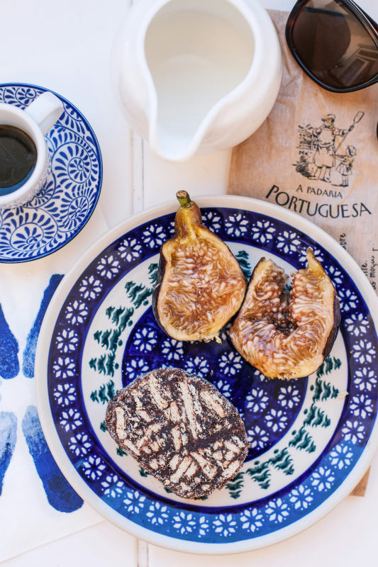 two-brown-and-white-pastries-on-blue-and-white-floral-ceramic-plate